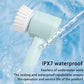 Light blue handheld electric cleaning brush spraying water from bristle head