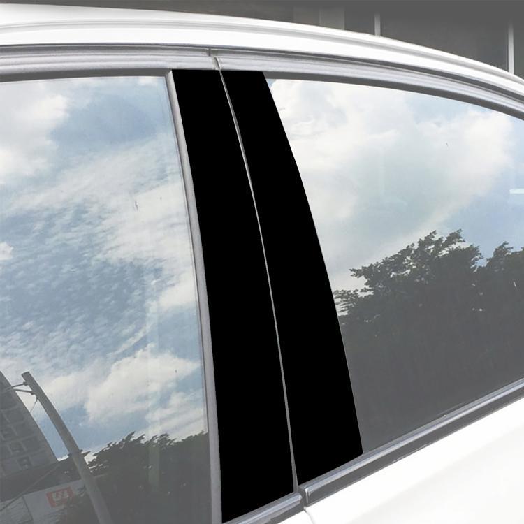 Single installed black vertical stripe decal on car door window