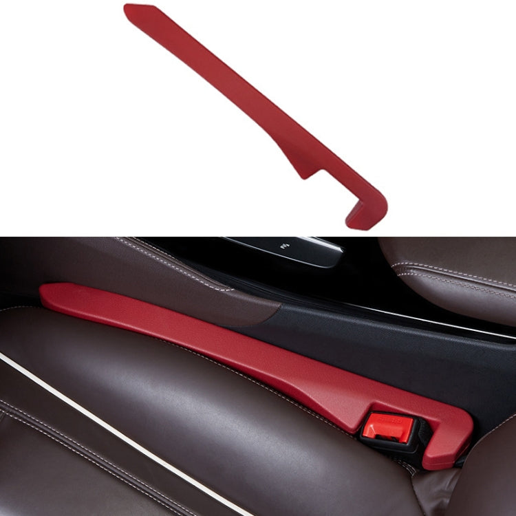 Red car seat gap filler strip with red latch for console gap.