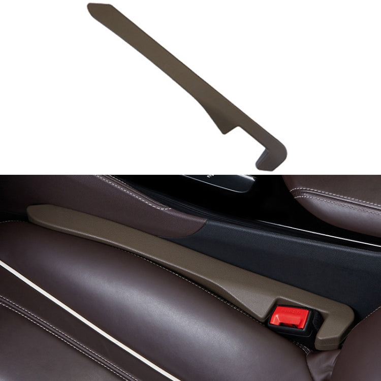Brown car seat gap filler strip with red latch for console gap.
