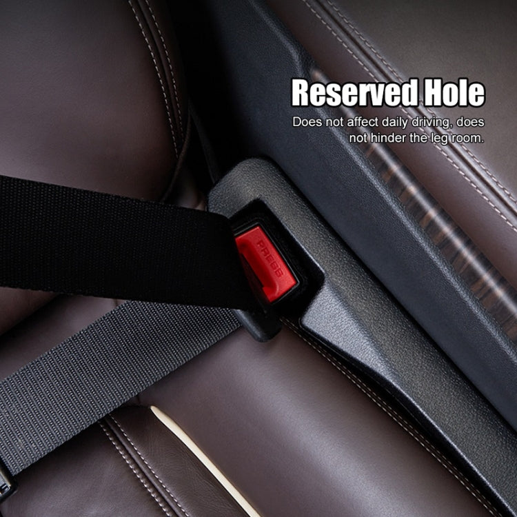 Car seat gap plug with red insert in dark seat crevice