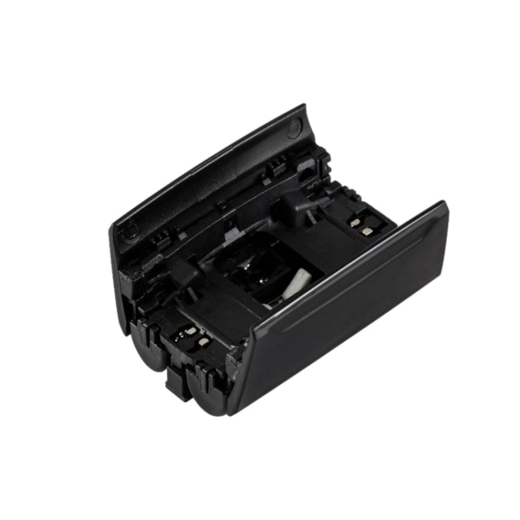 Replacement electric shaver head assembly, open black casing showing internal cutter parts.