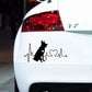 Black dog heartbeat car decal on white car rear panel