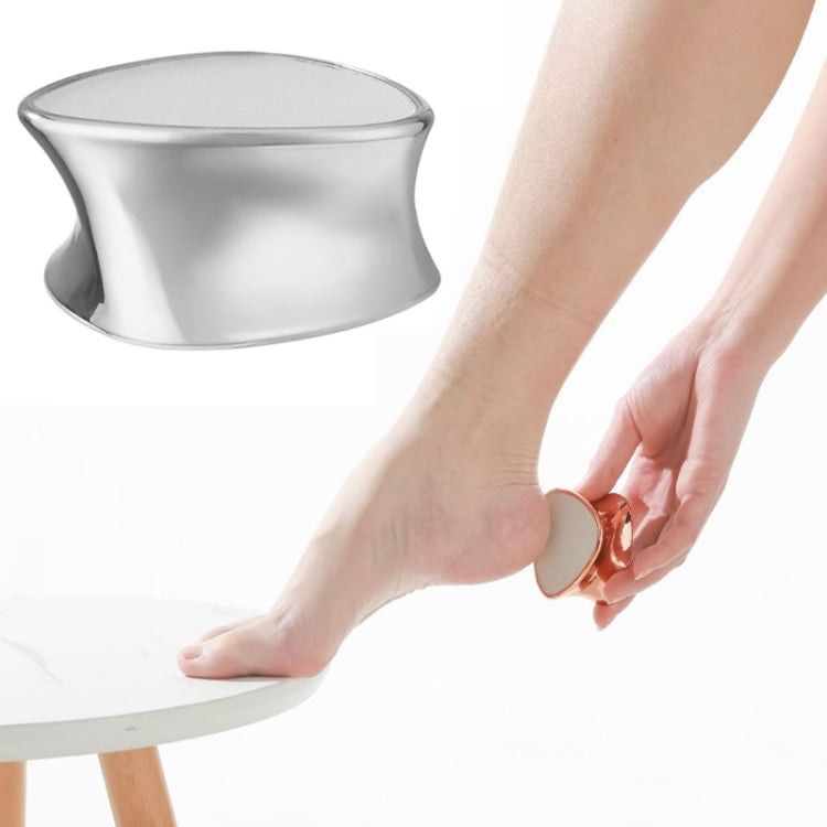 Silver handheld foot peeling grinder with curved textured grinding head for pedicure