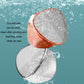 Rose gold and silver foot peeling grinder heads with water droplets on textured surfaces