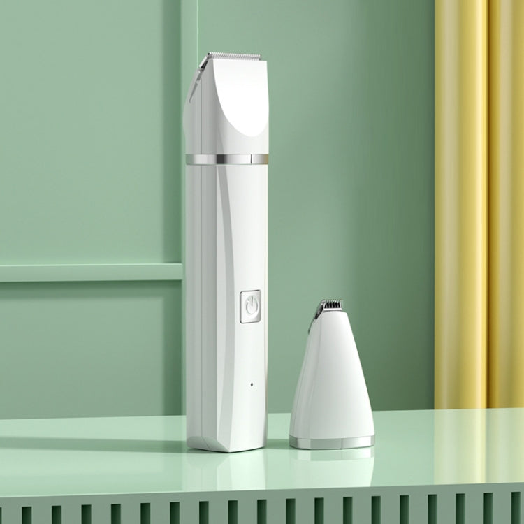 White electric pet hair clipper with cone grooming attachment on stand