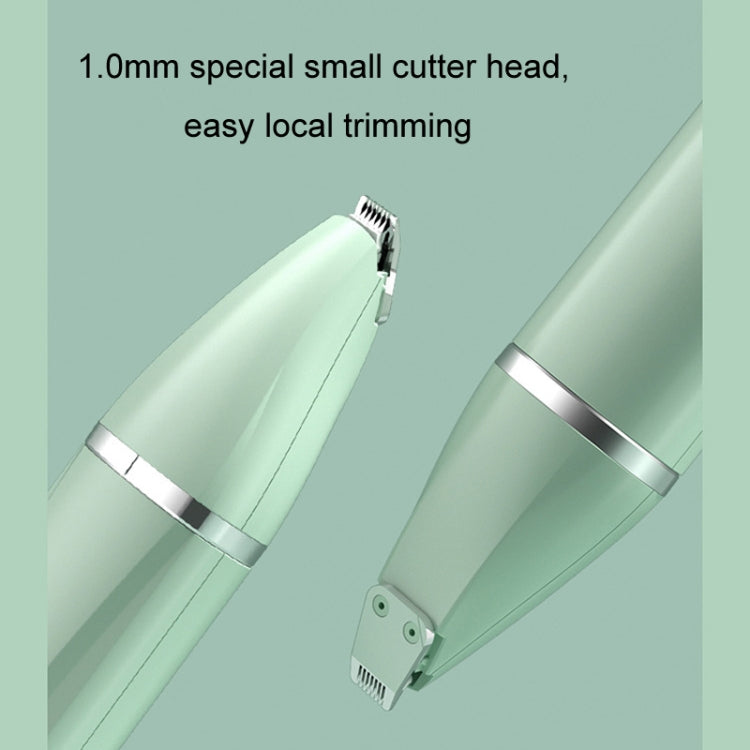Green electric pet clipper with small cutter head and spare blade