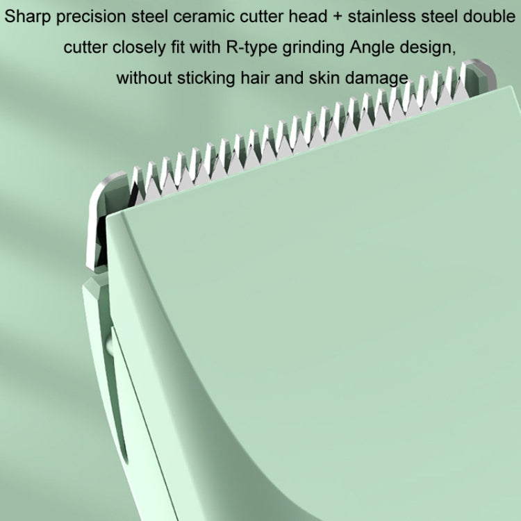 Green electric pet hair clipper cutter head with comb teeth and protective guard