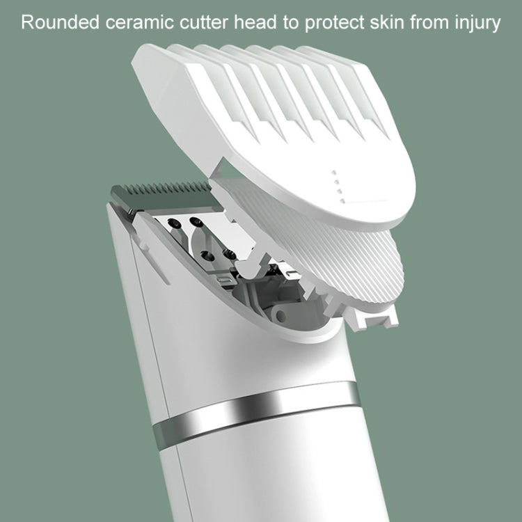 White and green pet clipper with rounded ceramic cutter head and guard