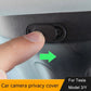 Camera privacy cover with shutter over lens, hand pressing sticker into place