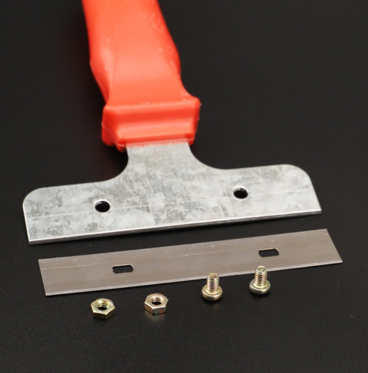 Window scraper head close-up with steel blade, red handle, and mounting screws