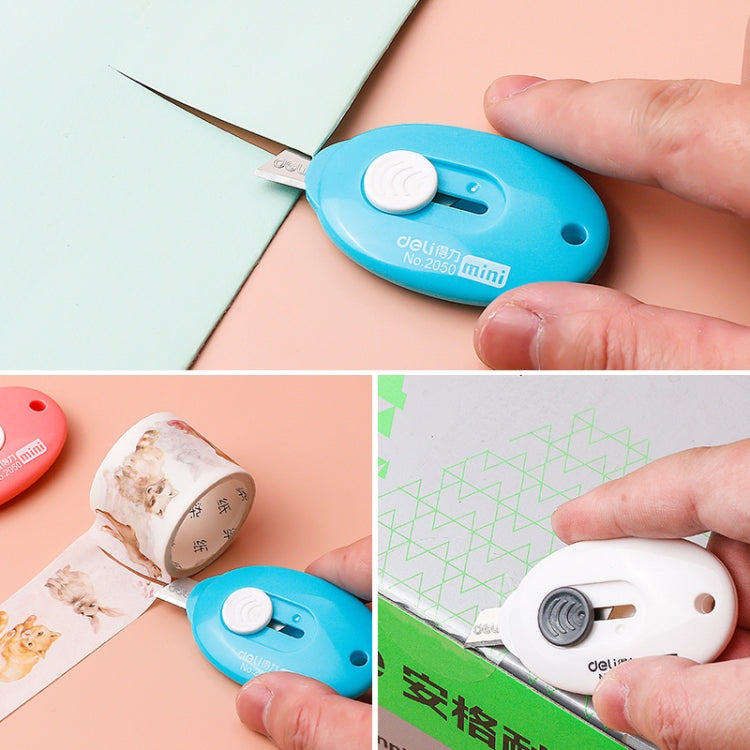 Blue mini utility knife cutting paper and tape; additional mini knife pieces shown.