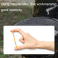 Yellow rubber band stretched by hand between fingers