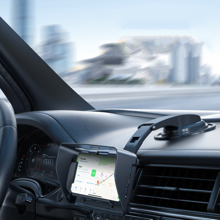 Car dashboard phone holder with black clamp and rotating cradle, mounted on air vent