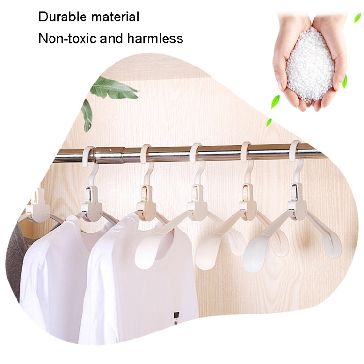 Plastic clothes drying rack with multiple wide-shoulder folding hangers on a rod
