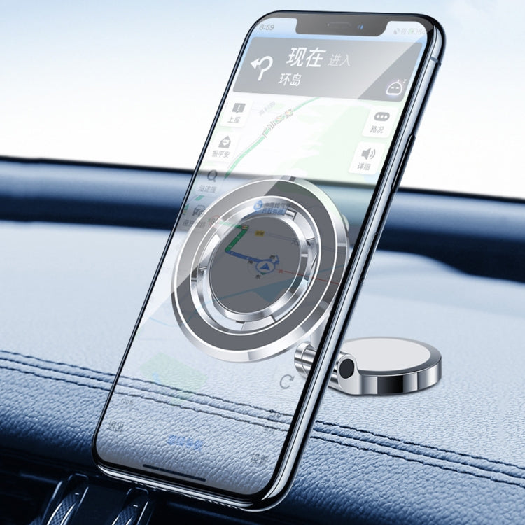 Silver magnetic phone holder holding a smartphone with round magnet ring