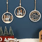 Three round wooden Christmas pendants hanging from twine strings; deer and “Merry Christmas” designs