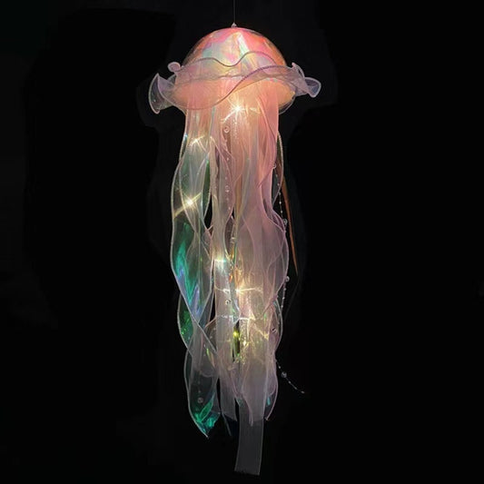 Iridescent jellyfish night light lamp with glowing string lights, hanging design.