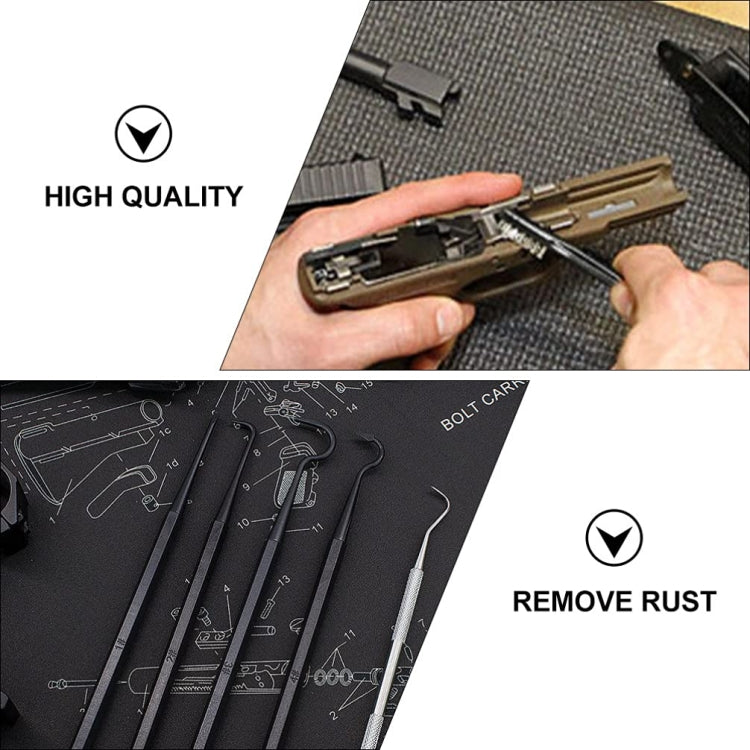 Hand using steel wire cleaning brushes on a metal surface for rust removal