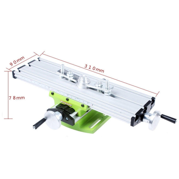 Aluminum milling carriage with green base, black end holders, and metal guide plate