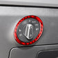 Red ring decorative sticker around headlight switch control on dash.