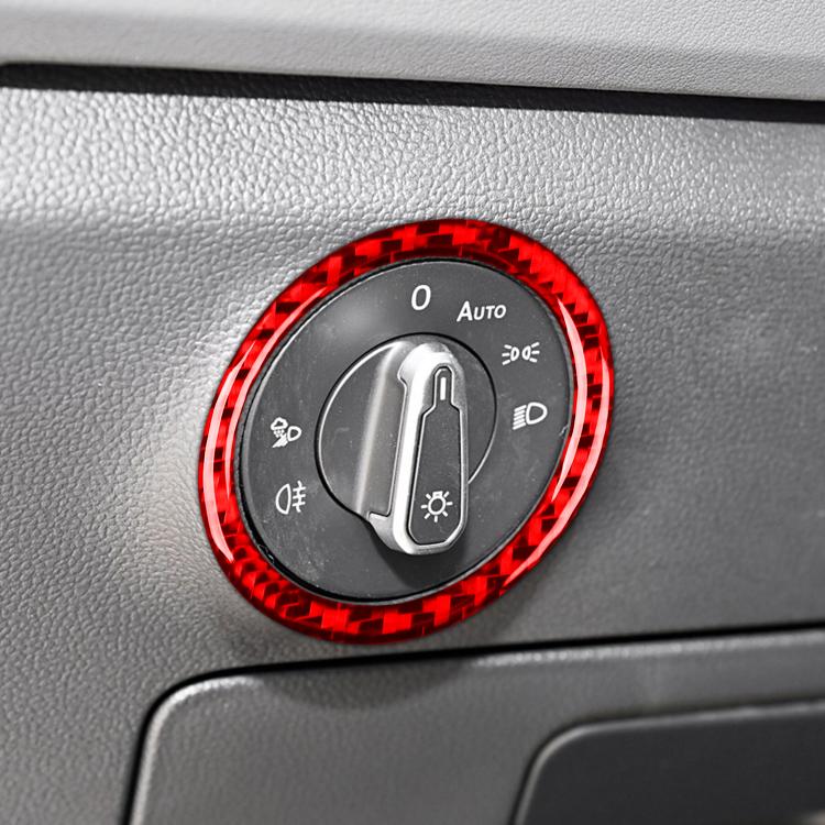 Red ring decorative sticker around headlight switch control on dash.