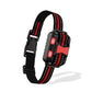 Dog training shock collar receiver with red indicator lights and orange trim strap