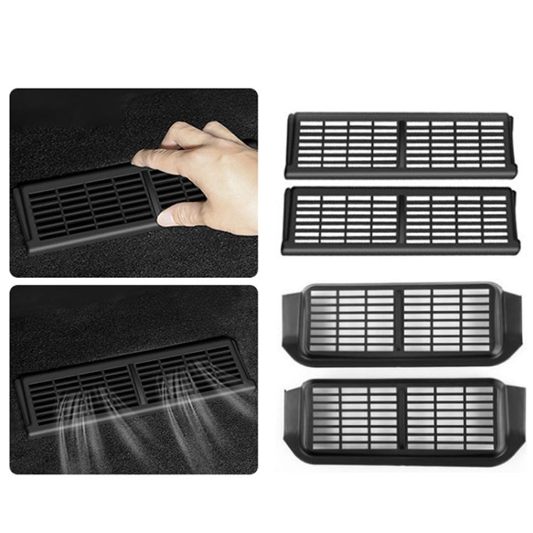 Pair under-seat vent covers, black rectangular grille; hand shows placement on car floor