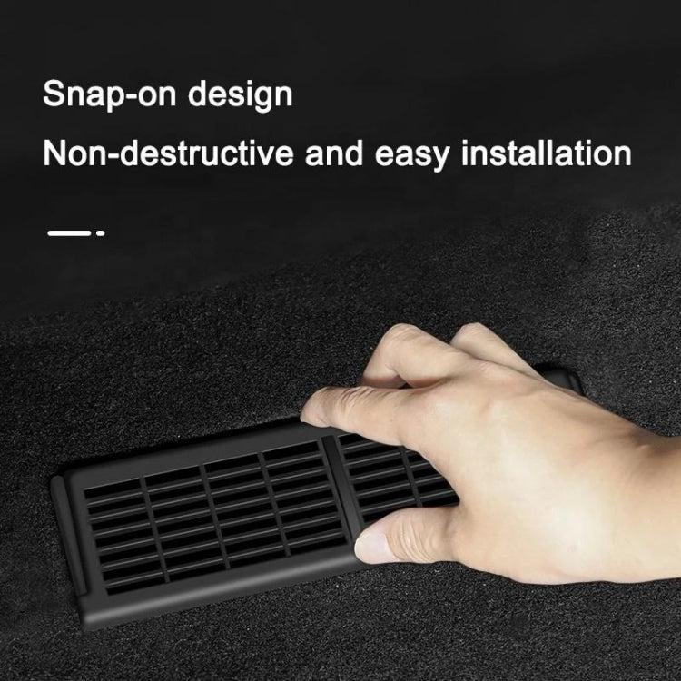 Snap-on under-seat vent cover, black grille insert; hand pressing it into place