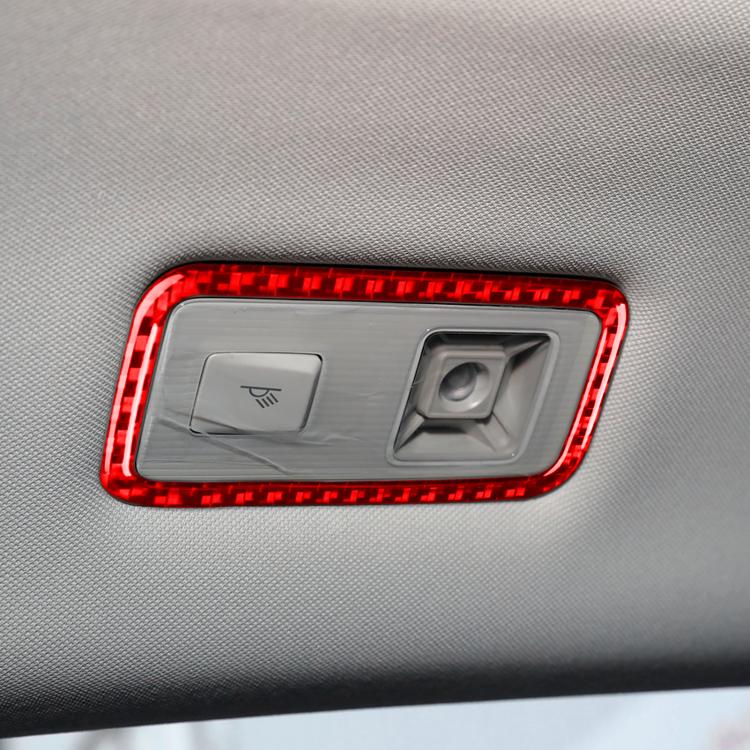Red-bordered reading light button sticker on car overhead panel