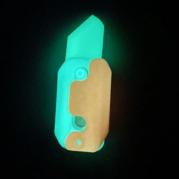 Glowing teal night-light gravity decompress toy with cutout handle shape
