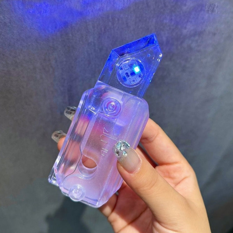 Clear blue gravity decompress toy with visible internal light and side hinge