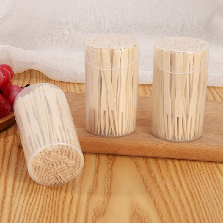 Bamboo two-tine dessert fork cans with one fork shown outside container