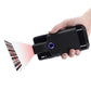 Black handheld back-clip barcode scanner held in hand, blue LED ring visible