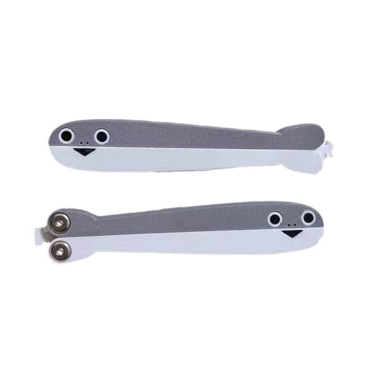 Gray and white folding butterfly knife toy, closed and open views with pivot bolts