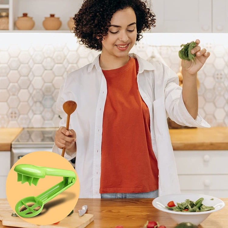 Person holding a green handheld fruit slicer tool in a kitchen setting