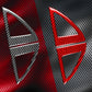 Close-up of red and black carbon-fiber inner A-pillar speaker cover with triangular cutout