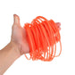 Red orange nylon trimmer line coil held in a hand.