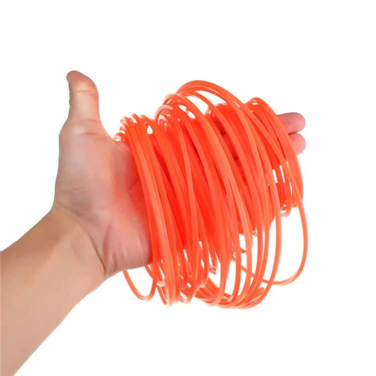 Red orange nylon trimmer line coil held in a hand.