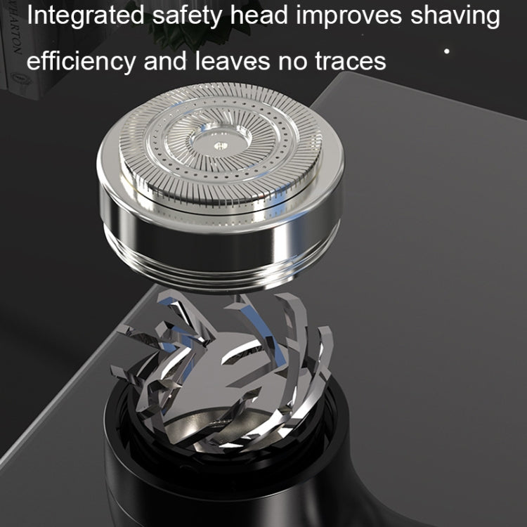 Electric shaver shaving head close-up with safety guard and blade assembly