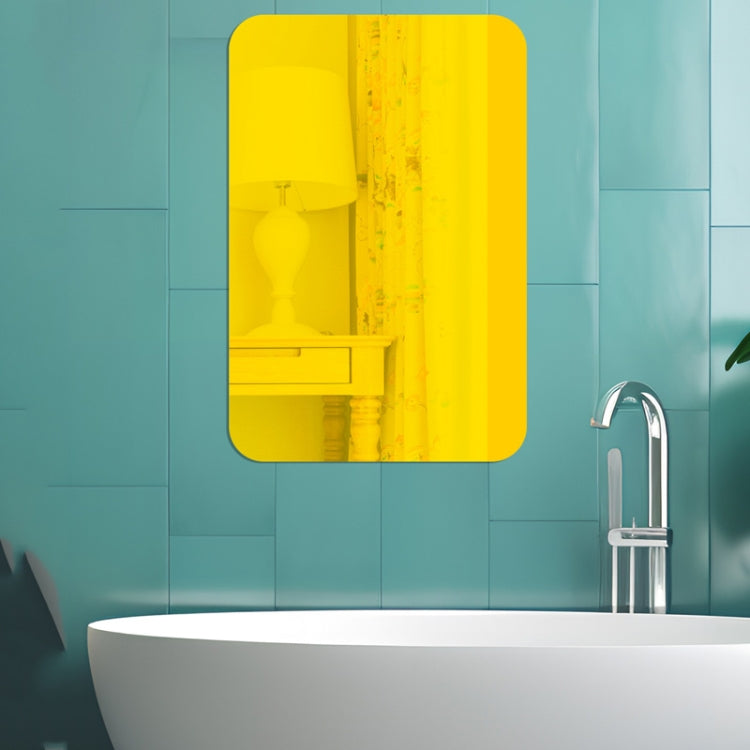 Gold rectangular acrylic mirror wall sticker with rounded corners, reflective surface.