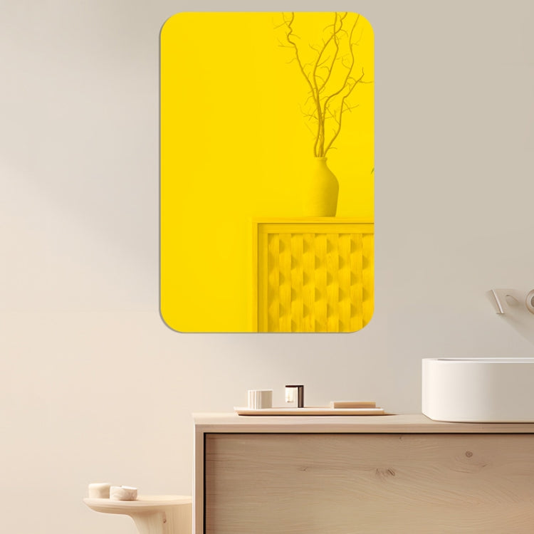 Gold rectangular acrylic mirror wall sticker with rounded corners, glossy reflective panel.
