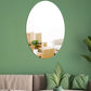 Oval acrylic mirror wall sticker with reflective surface for easy wall decoration