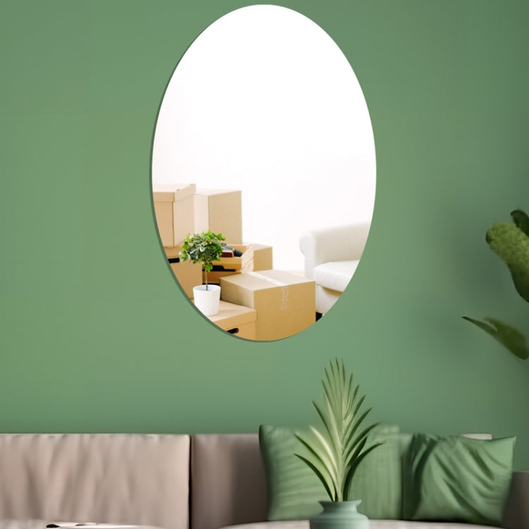 Oval acrylic mirror wall sticker with reflective surface for easy wall decoration