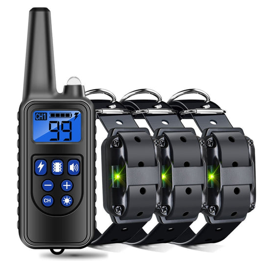 Black handheld dog training remote with blue screen and three anti-bark vibration collars