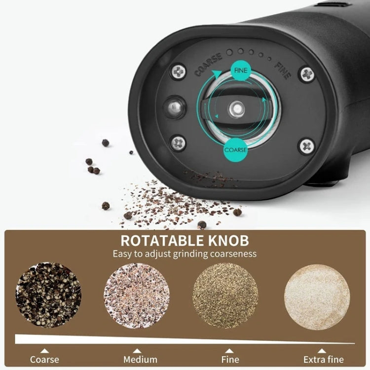 Rotatable coarseness knob on an electric salt and pepper grinder with LED-lit chamber