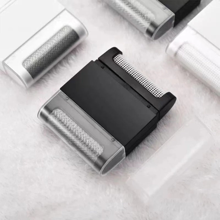 Double-sided fabric shaver with metal-grab mesh end and flannel-style lint-removal pad