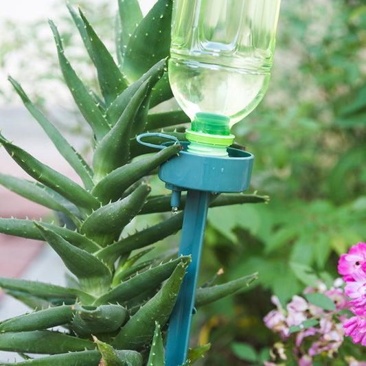 Automatic flower watering device with switch valve, attached to plant stem