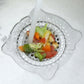 Disposable non-woven drain filter sticker catching food scraps over a floor drain
