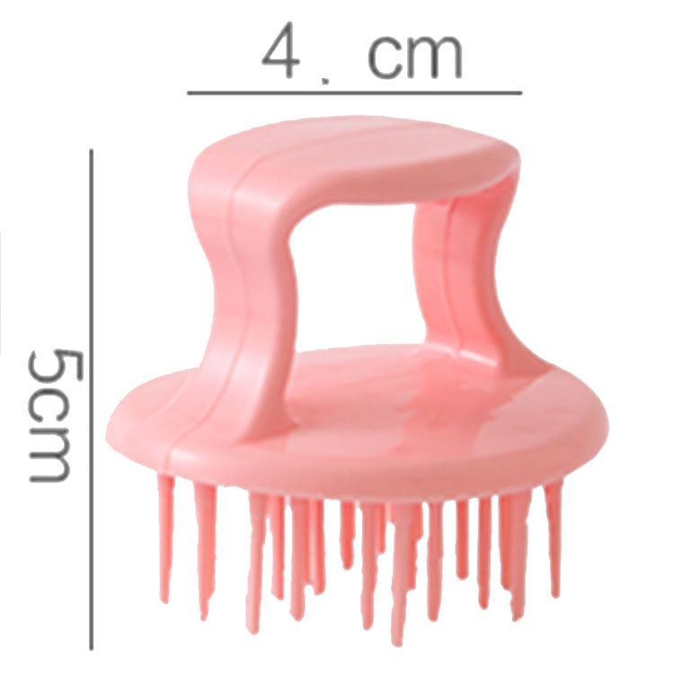 Pink dish scrub brush with gray steel abrasive ball and comb-like plastic handle